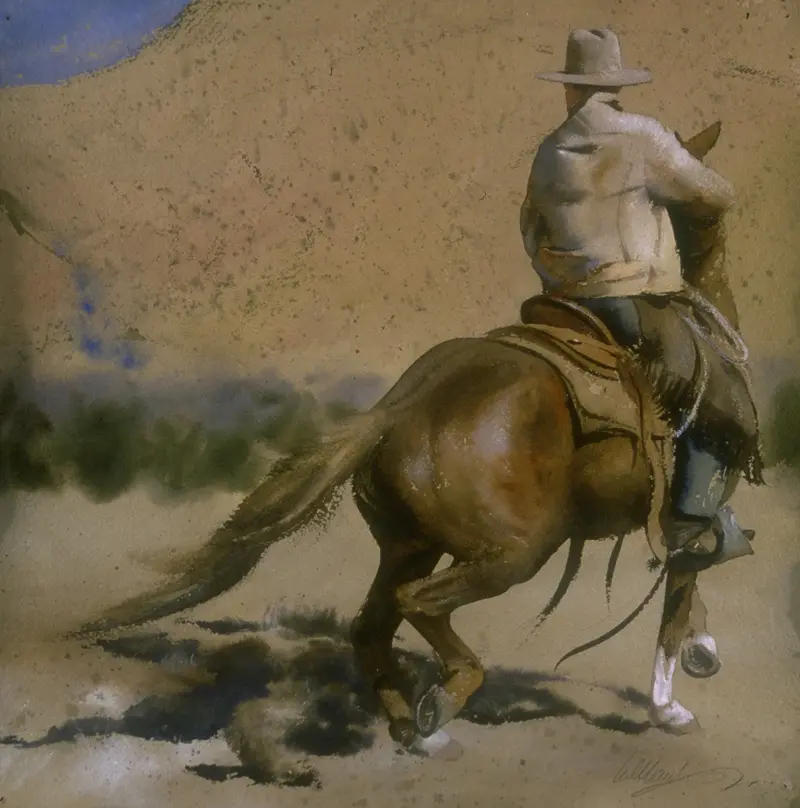 A cowboy on his horse